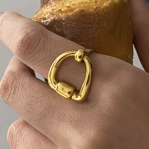 18K gold plated titanium steel ring featuring a minimalist horseshoe industrial design