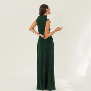 Detail view of the shimmering dark green fabric and back drape of the sleeveless maxi dress