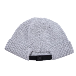 Detail of grey knitted docker hat featuring an adjustable back strap with plastic buckle