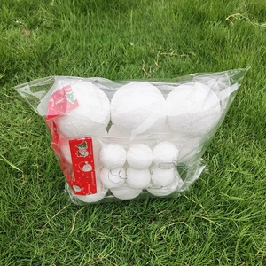 White foam snowballs in multiple sizes for Christmas tree decor in clear festive packaging