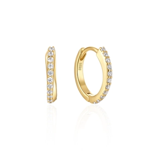 Detail of S925 sterling silver hoop earrings with gold plating and sparkling cubic zirconia