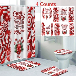 Christmas bathroom set with candy cane theme shower curtain and matching non-slip mats