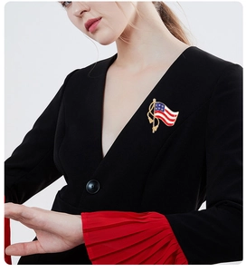 Detail of USA flag brooch with tassel on black suit lapel for Independence Day