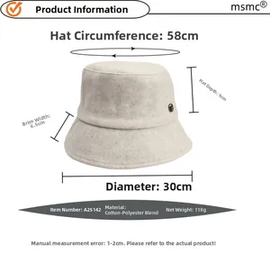Gray wool bucket hat with size chart showing 58cm circumference and metal detail