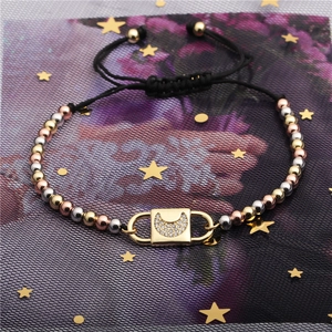 Adjustable black rope bracelet with tri-color metallic beads and zircon moon pendant