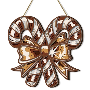 Christmas wooden door sign featuring candy canes and bow for holiday wall decoration