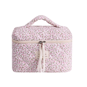 Pink cherry blossom quilted makeup bag with handle and double zipper for travel