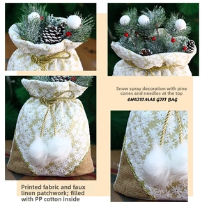 Detail of floral fabric Christmas gift bag with snow pine needles and pine cones