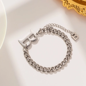 Silver chunky chain bracelet with letter B pendant and polished metal finish