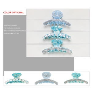 Elegant blue shell hair claw clips with marble pattern and sparkling rhinestones