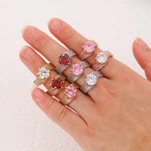 Detailed view of fashion three-row twisted rings with vibrant colorful zircon stones