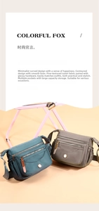 Detail of multi-pocket nylon shoulder bags in teal and taupe with polished metal hardware