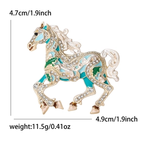 Golden pony brooch with blue and green enamel and sparkling white rhinestones