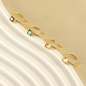 Set of four 18k gold plated stainless steel rings with square colorful gemstones
