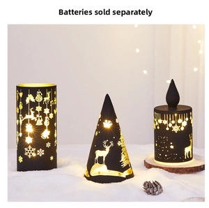 Close-up of black Christmas lanterns with reindeer cutouts and warm LED light details