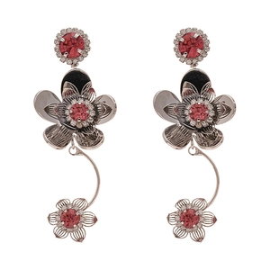 Pink zircon flower dangle earrings with silver metal finish and three floral charms