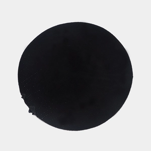 Detailed top view of black French wool beret with intricate dot texture and knit finish