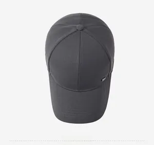 Top-down view of dark grey baseball cap showing six-panel structure and metal side detail