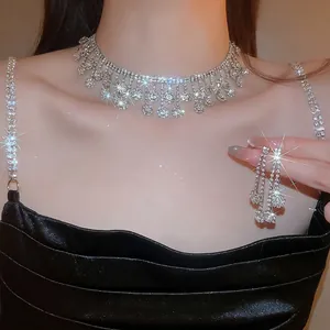 Elegant rhinestone waterdrop fringe necklace and earrings set with luxurious sparkle