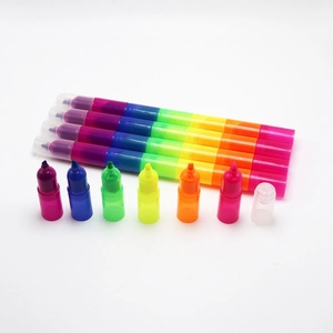 Close-up of stackable rainbow highlighter pens with detachable colored segments on white background