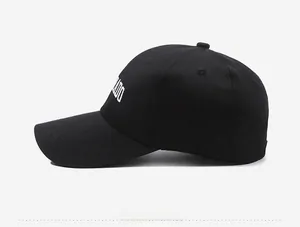 Detailed side view of black baseball cap featuring white LADO letter embroidery