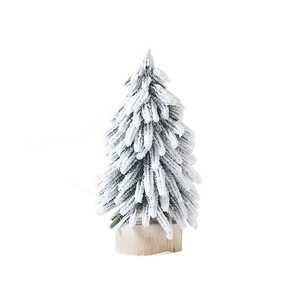 Mini snow-flocked Christmas tree with natural wood base for festive desktop decoration