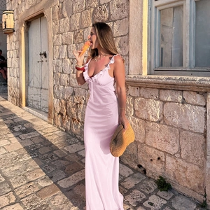 Pink ruffle slip dress for women in flowy fabric with a French vacation lifestyle look