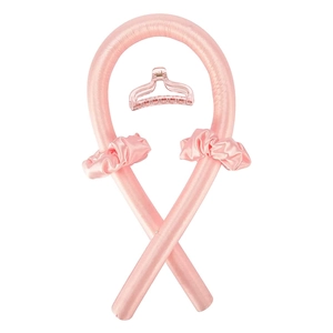 Pink silk heatless hair curler set with two matching scrunchies and a clear claw clip