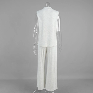 Detail view of the back of a light grey knit lounge set with sleeveless top and wide-leg pants