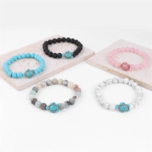 Five sets of natural stone turtle bracelets featuring pink quartz and turquoise beads