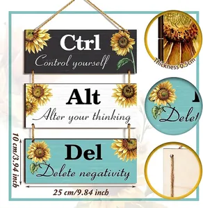 Detail of wooden sunflower wall plaques showing texture, printing, and rope hanger