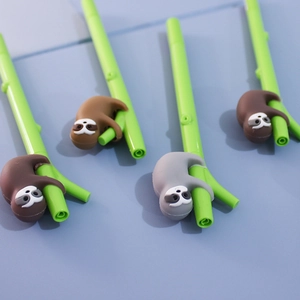 Detail of four creative sloth pens with bamboo-shaped barrels and cute sloth characters