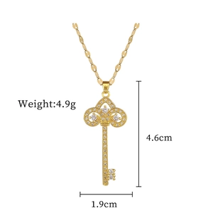 Detailed view of crown key necklace with measurements 4.6cm by 1.9cm and 4.9g weight