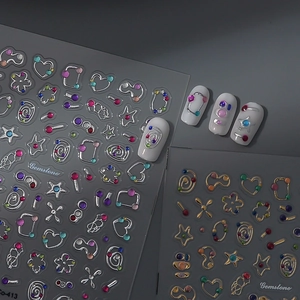 3D gemstone nail art stickers with metallic gold stars and hearts for DIY manicure