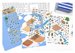 Detail showing isometric architectural and furniture stickers on a desk workspace