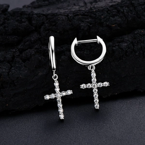 Detailed view of 925 sterling silver hoop earrings with zircon-set cross pendants