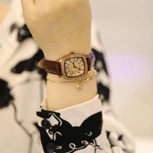 Elegant vintage square tonneau ladies watch with diamond bezel and brown leather strap