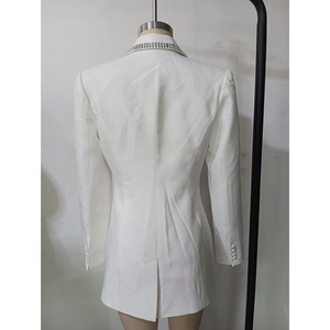 Back view of a white slim-fit blazer dress featuring rhinestone-trimmed lapel and cuffs