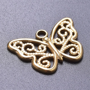 Macro shot of gold-plated hollow butterfly pendant for DIY stainless steel necklaces