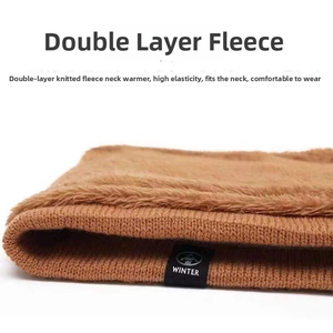 Close-up of brown winter neck warmer showing thick knit texture and warm fleece lining