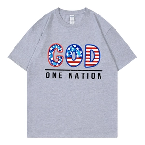 Grey crew neck T-shirt with American flag GOD ONE NATION graphic print in a flat lay view