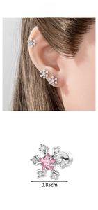 Detailed view of silver snowflake ear stud with pink star zircon and size dimension 0.85cm