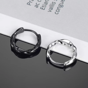 Unisex twisted cable hoop earrings in black and silver surgical stainless steel
