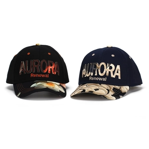 Detail of baseball caps with Aurora embroidery and floral prints on the brim
