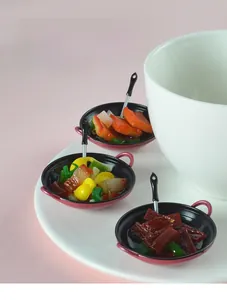 Miniature dollhouse resin food model showing highly detailed stir-fry dishes on tiny plates