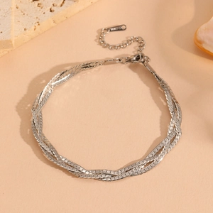 Detailed macro view of multi-strand silver stainless steel snake chain with lobster clasp