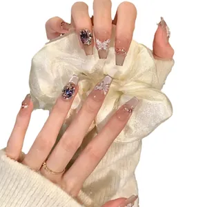 Handmade coffin press-on nails with 3D butterfly, purple gems, and pink gradient