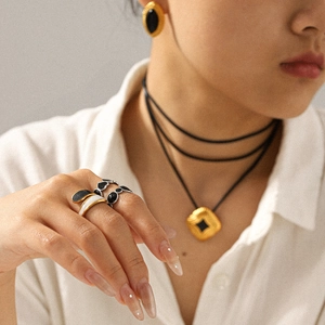 Square hammered 18k gold plated necklace and earrings set with black resin stones
