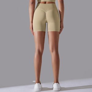 Rear view of khaki seamless high-waist biker shorts with V-shaped lifting contour