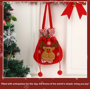 Detail of Christmas reindeer drawstring gift bag with plush fabric and snowflake embroidery